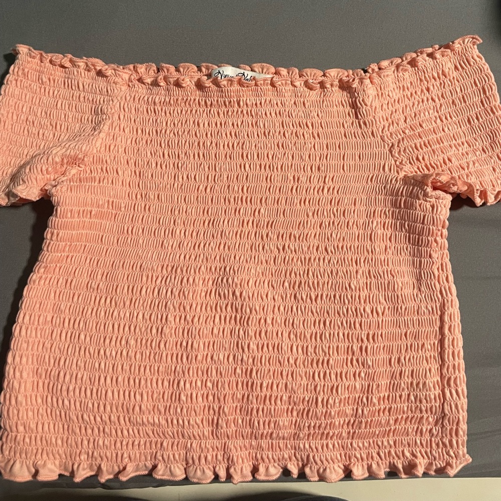 light pink/peach color shoulder crop top in good condition barely worn.